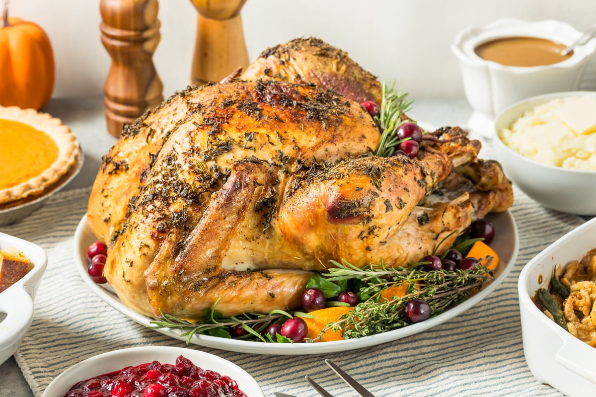 Little Blue's Farm turkey: a whole roasted bird on a holiday table ready to carve