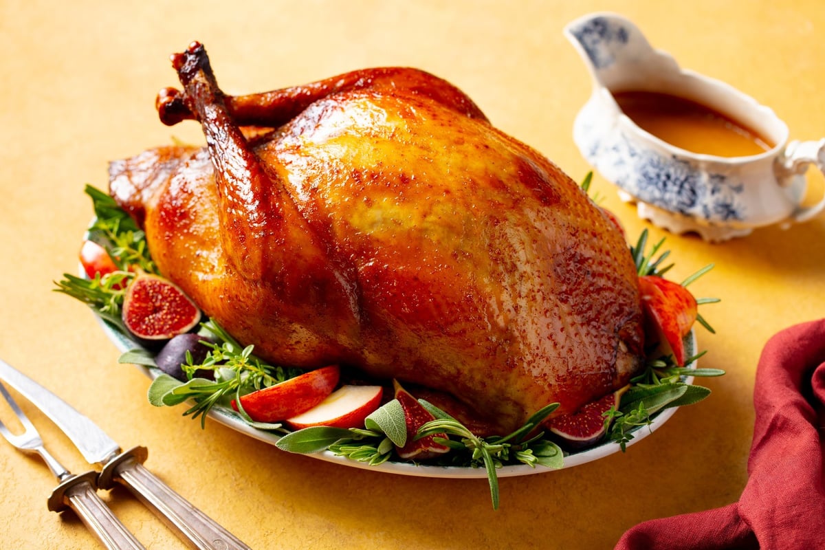 Little Blue's Farm smoked whole turkey: a glazed holiday bird on a serving platter